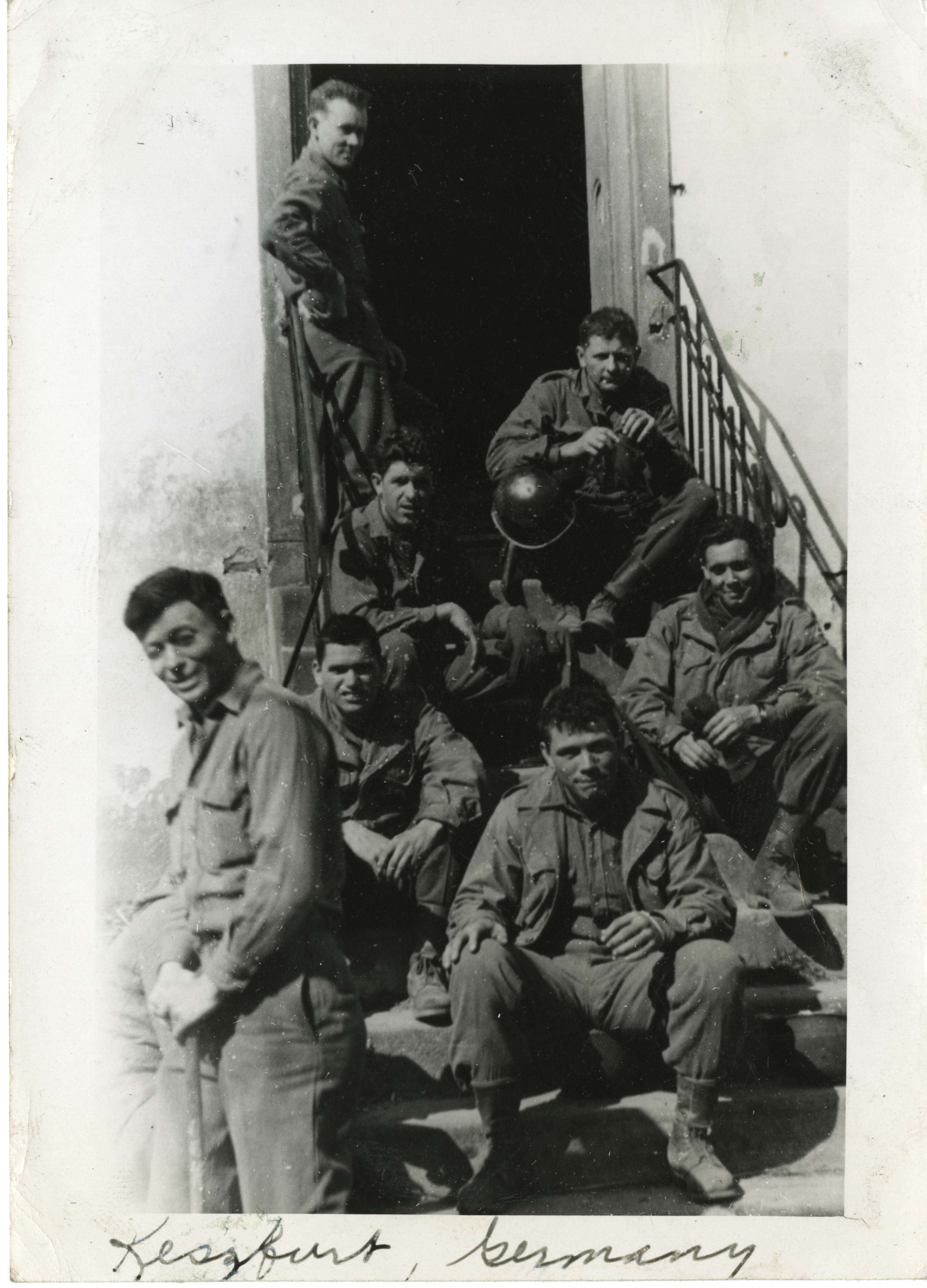 Soldiers resting on steps in Germany | The Digital Collections of the National WWII Museum ...
