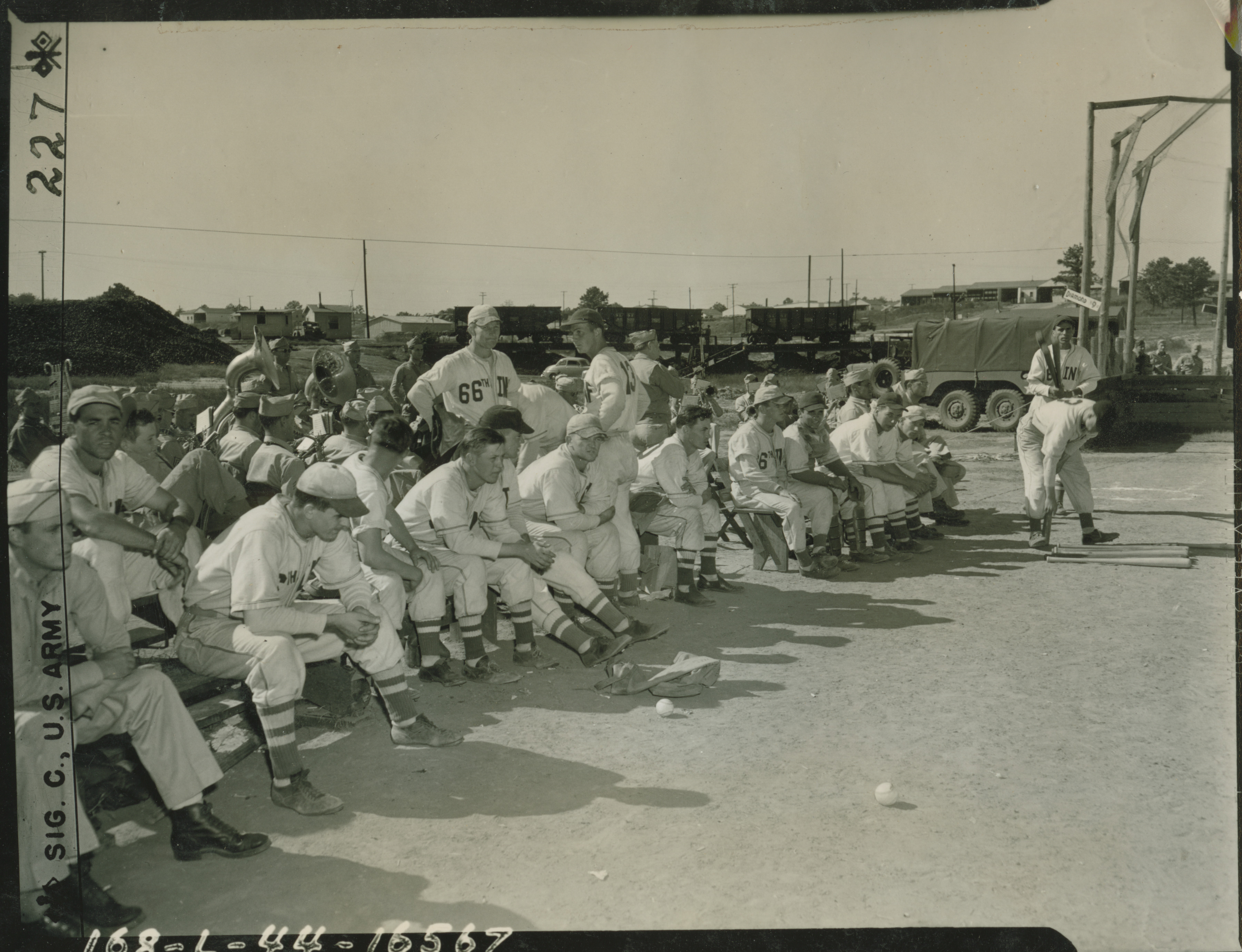 Bob Feller, former Cleveland Indian great, blasts a strike past an opposing  batter during a game in which he struck out 18 men at Efate in the New  Hebrides in 16 May