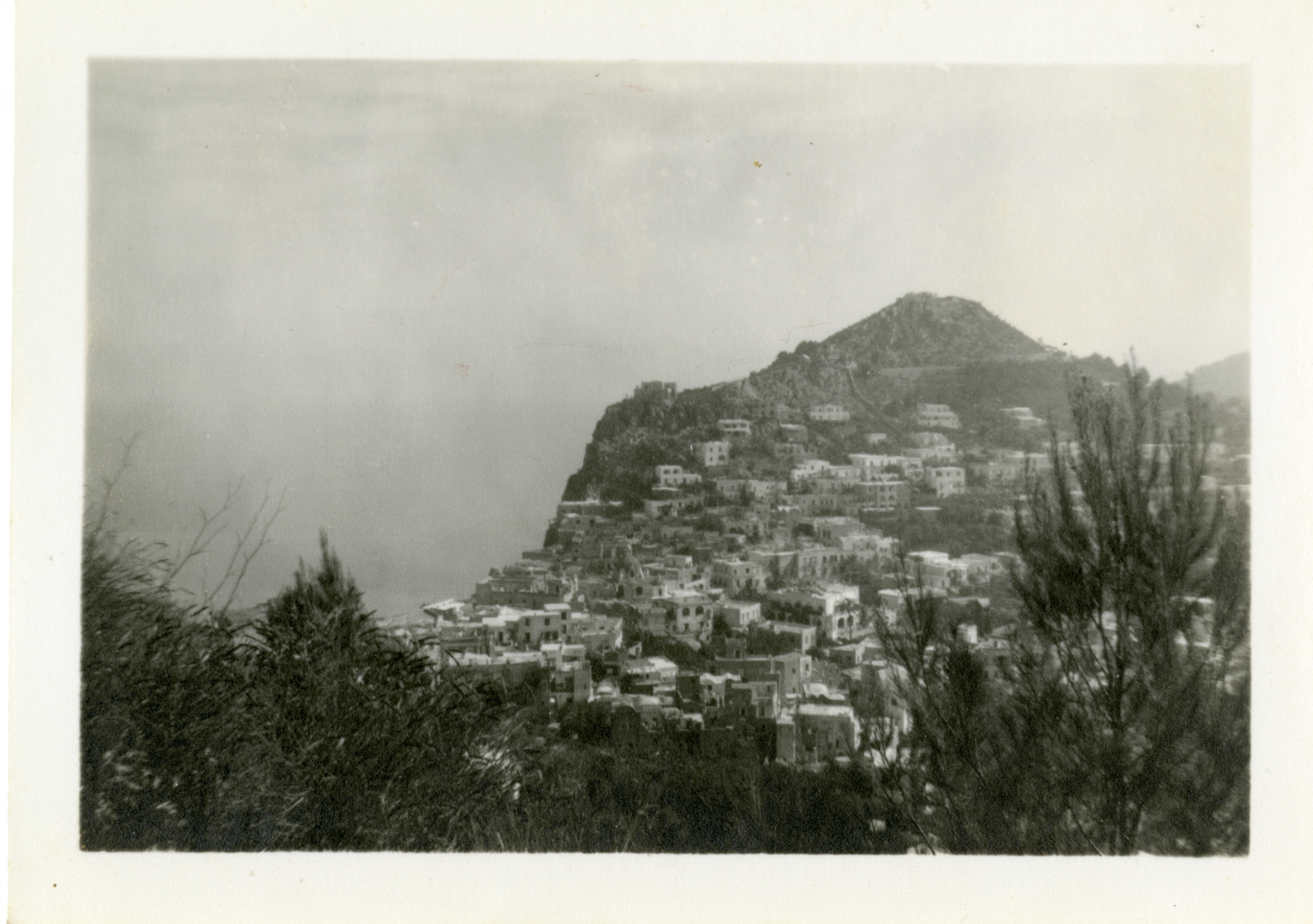 View looking down onto the city of Capri from the mountains above in ...