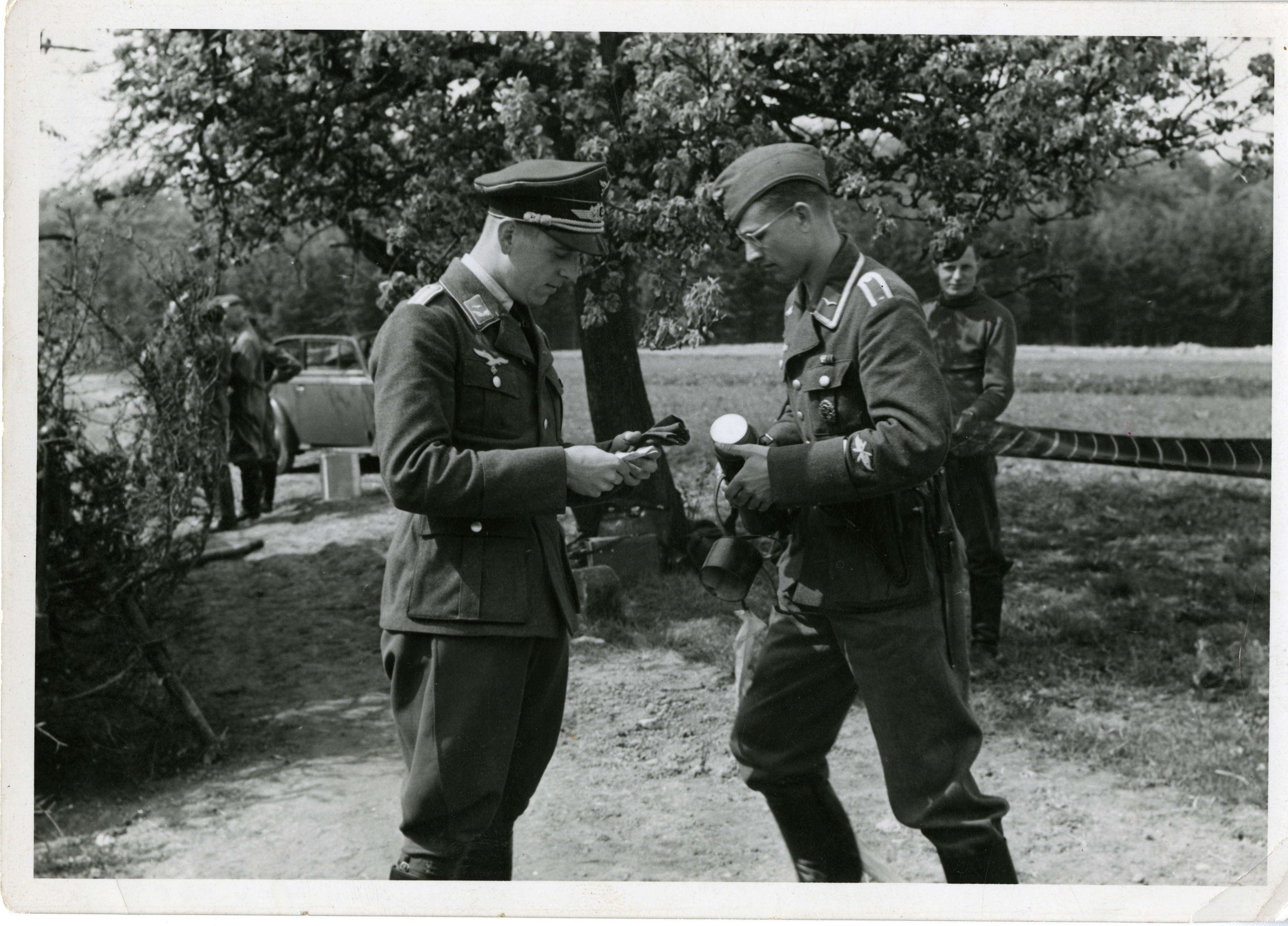 Two German soldiers hold message container, Germany, 1940 | The Digital ...