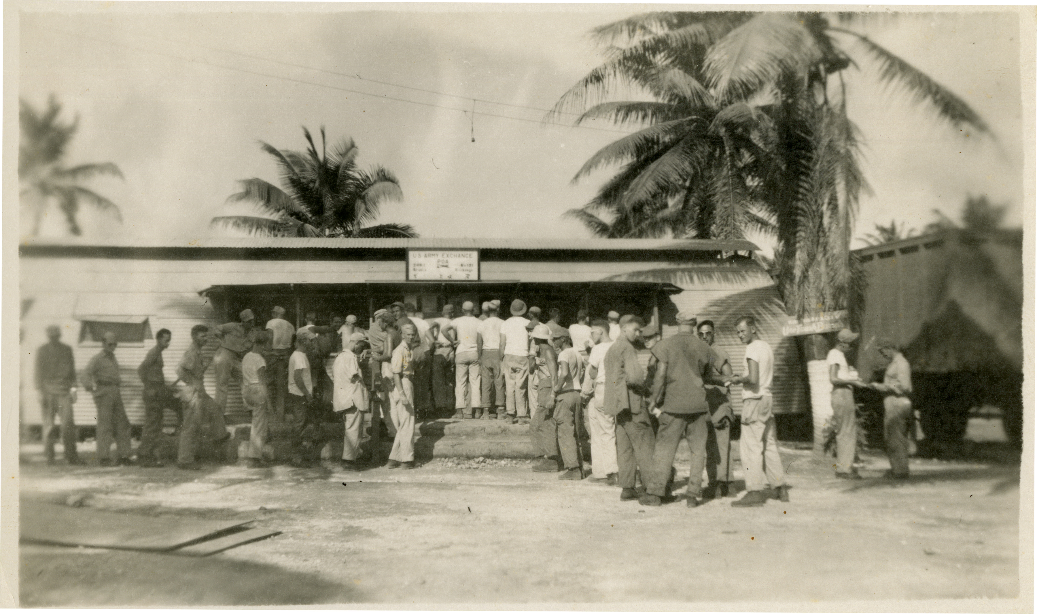 US servicemen standing in line for the US Army Exchange, Guam | The ...