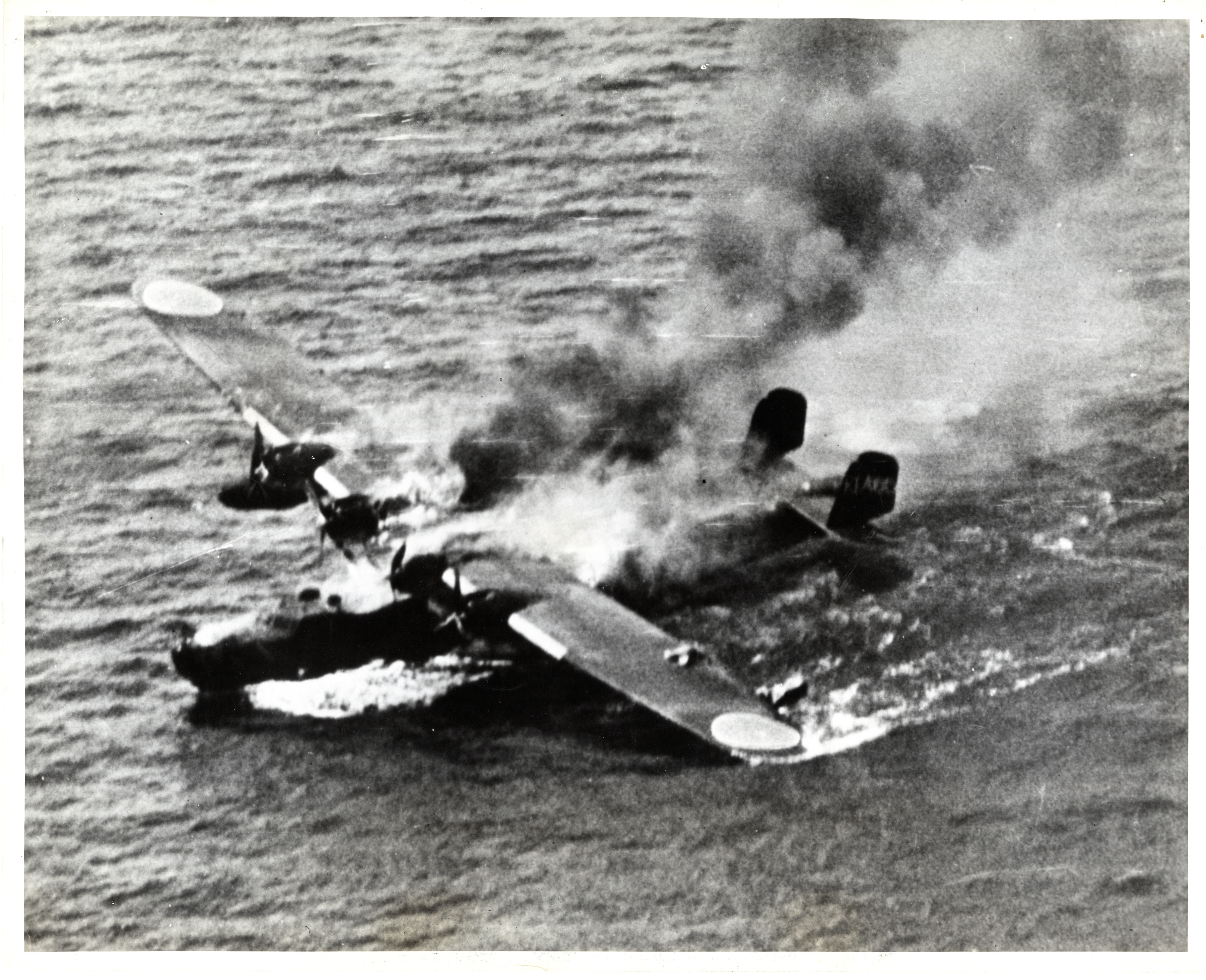Confront Forward Calligrapher Burning Japanese bomber in the Pacific Ocean, 1945 | The Digital  Collections of the National WWII Museum : Oral Histories