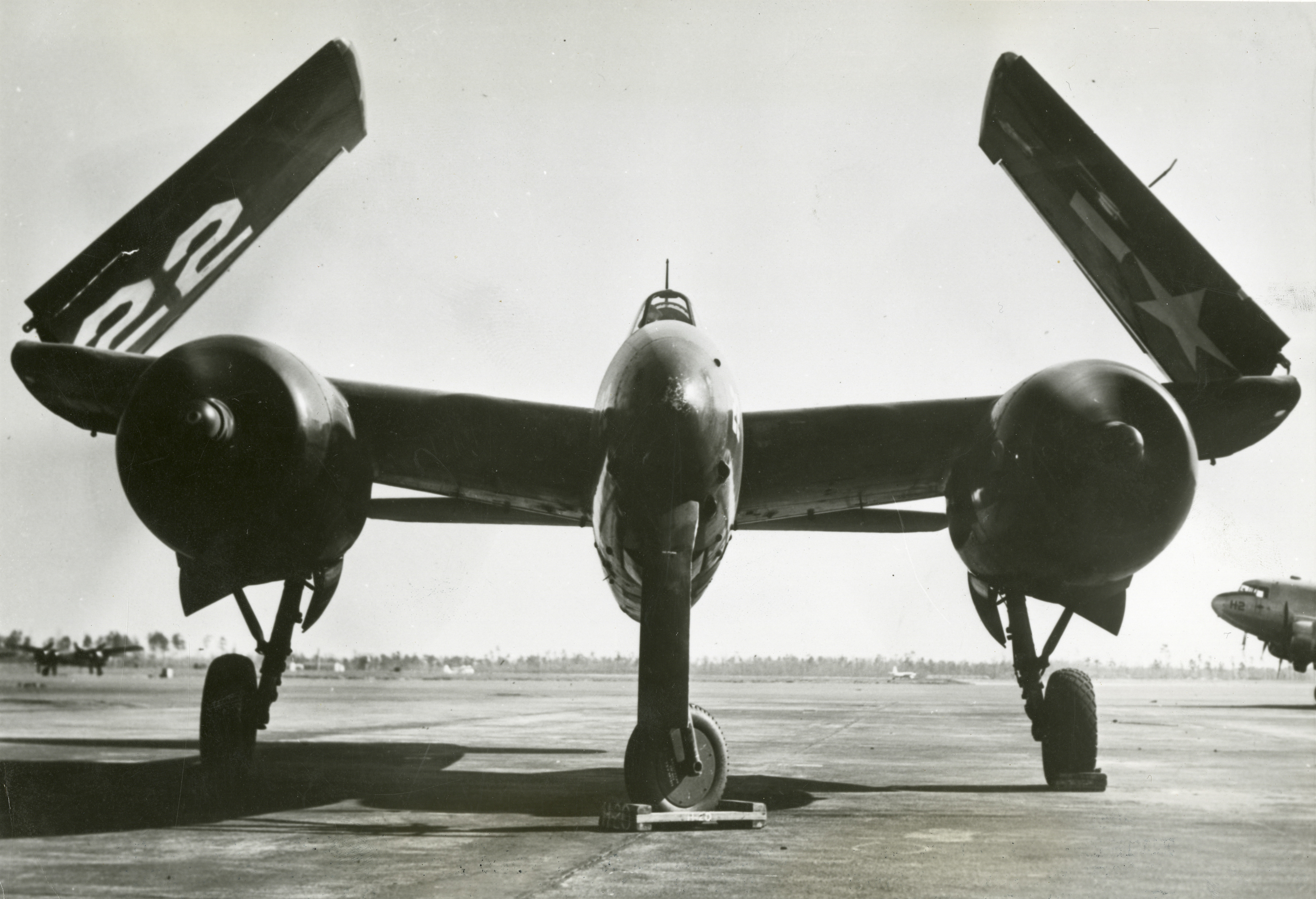 Grumman F7F Tigercat fighter plane parked on a roadway | The Digital ...