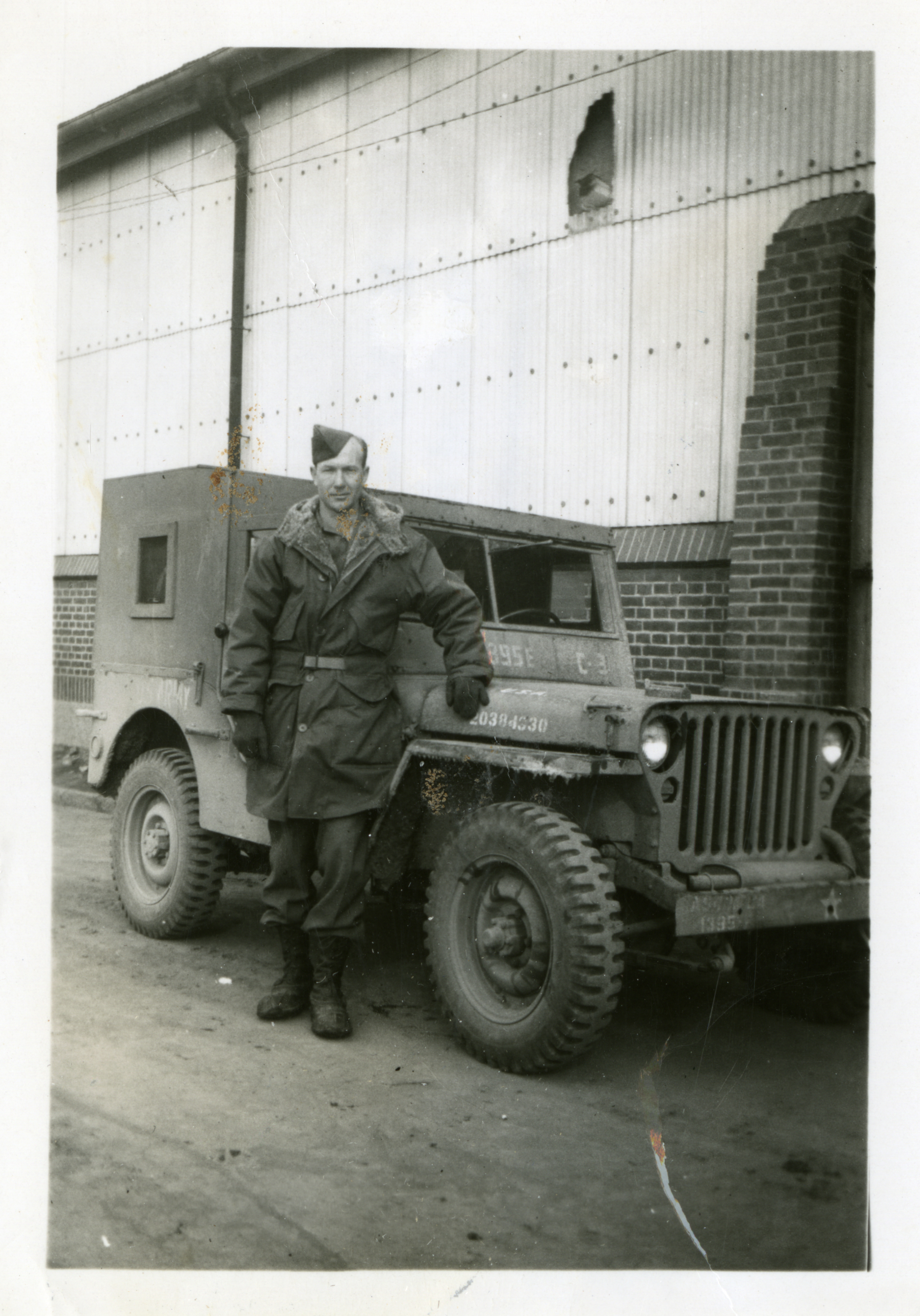 Reed in winter gear poses next to a Jeep | The Digital Collections of ...