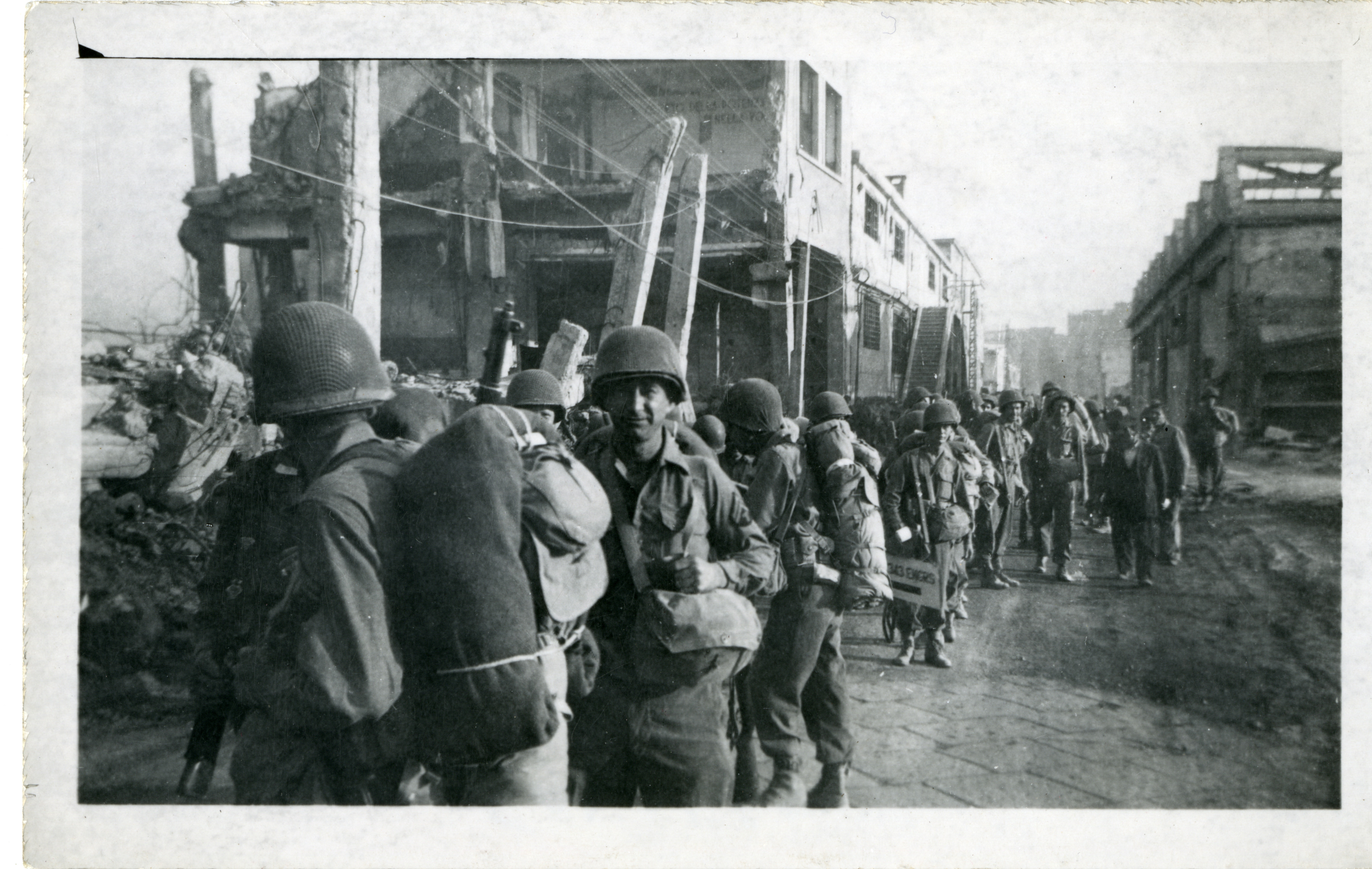 Servicemen lined up near buildings, ETO | The Digital Collections of ...