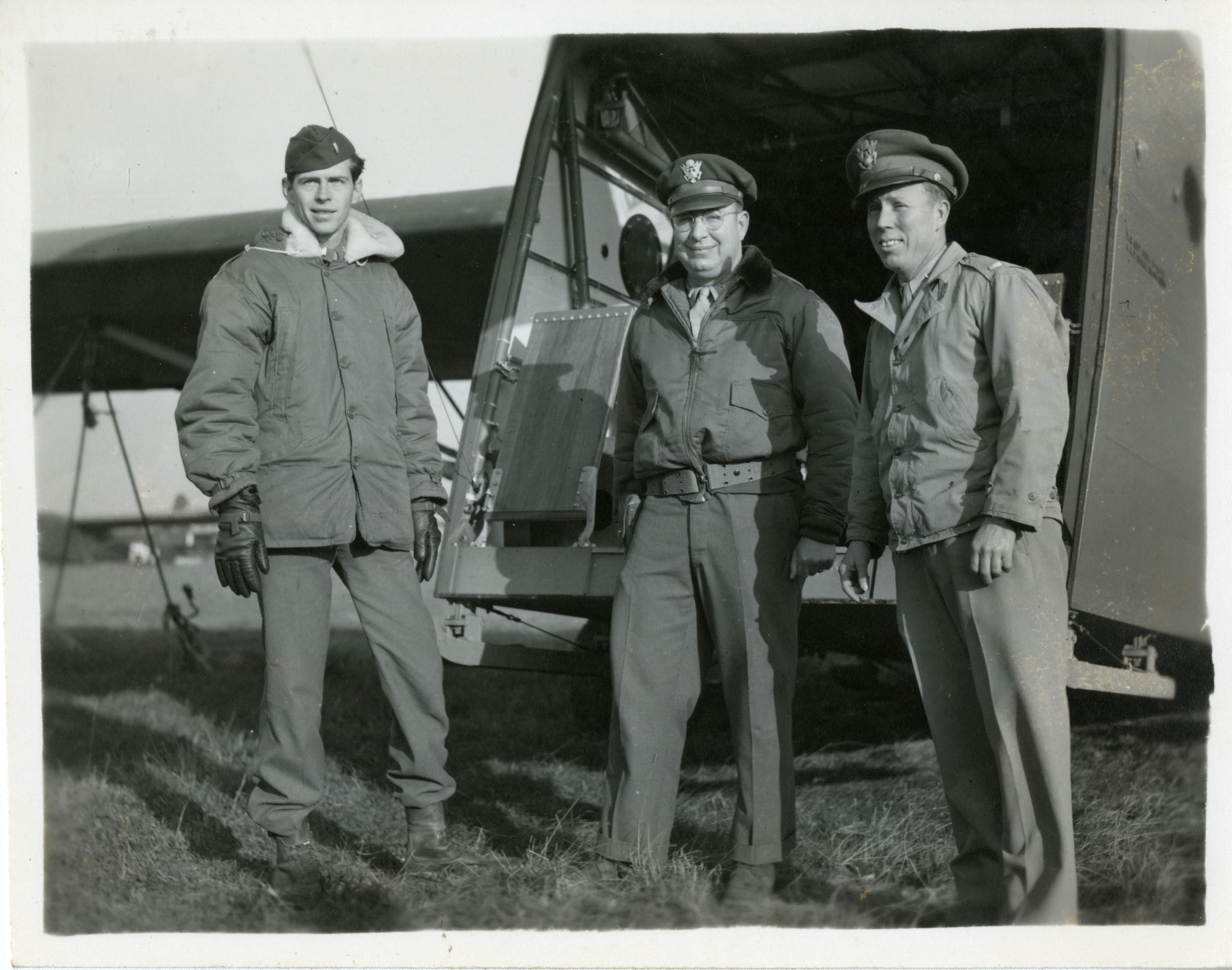 Three officers stand in front of Waco CG-4 glider | The Digital ...