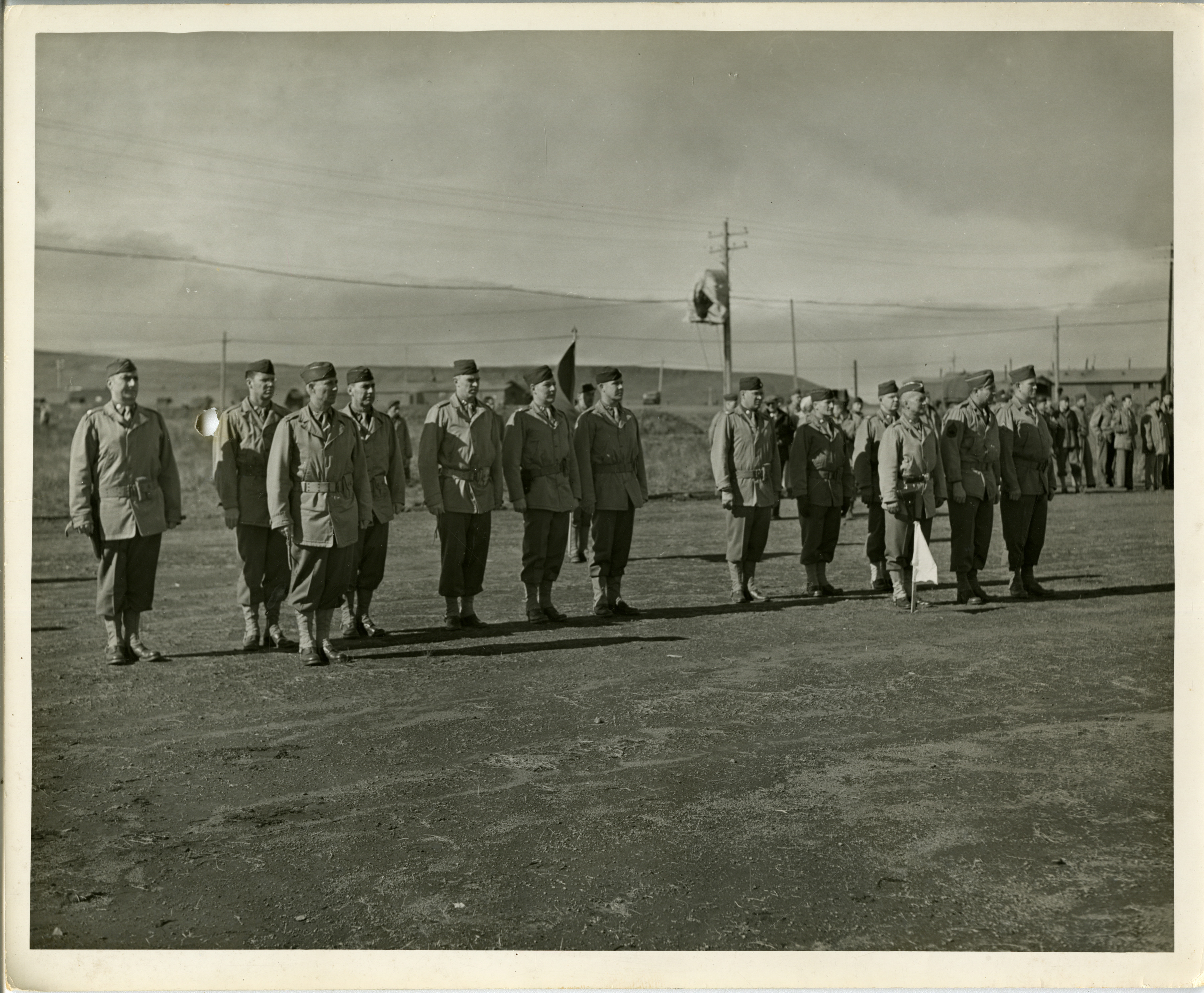 Soldiers stand at attention on a parade ground. Aleutian Islands | The ...